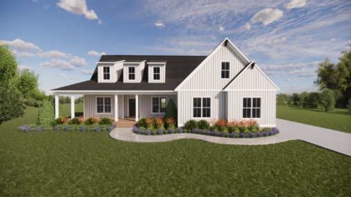 White farmhouse with black roof, dormer windows, front porch, and garden, set on a green lawn under a blue sky.